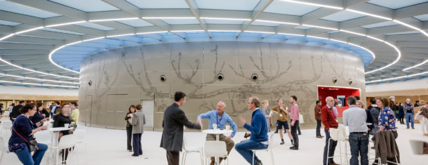Image of delegates networking in the Exhibition Space