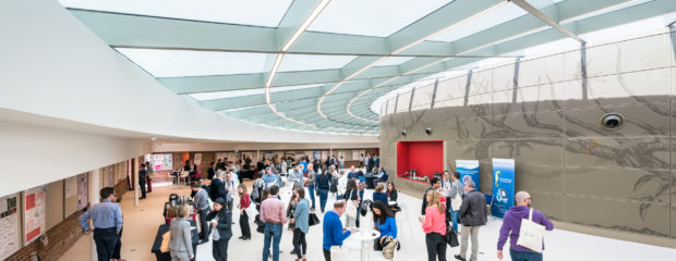 Image of delegates networking in the Exhibition Space