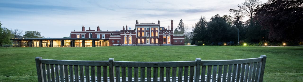 Image of Hinxton Hall and lawns at dusk