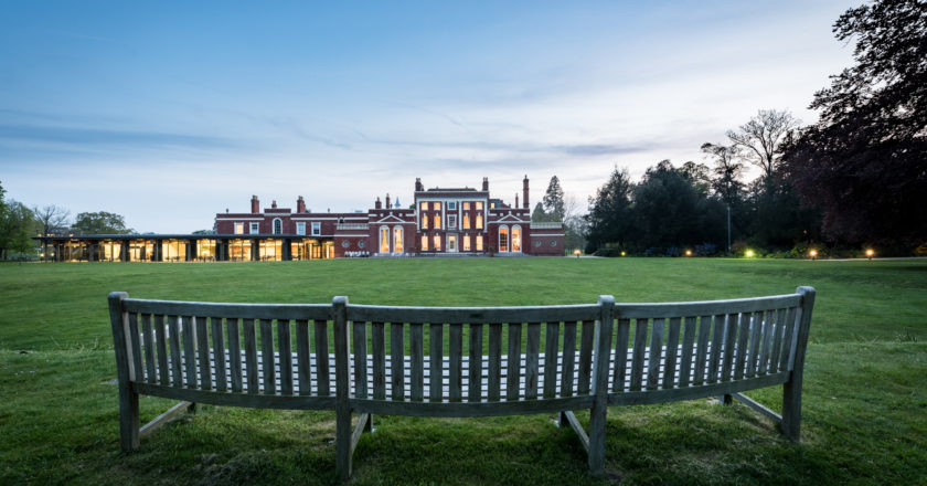Image of Hinxton Hall and lawns at dusk