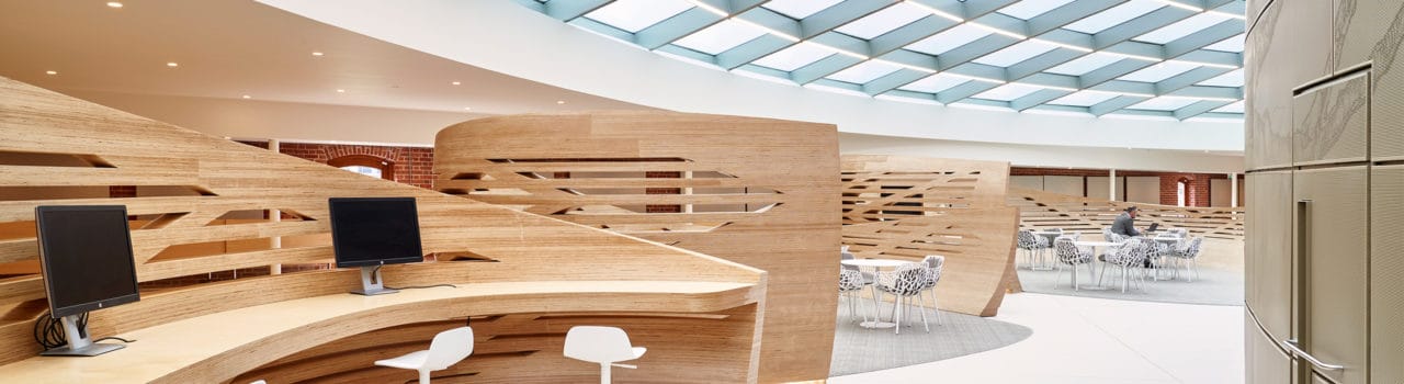 Slatted wooden 'wraps' in the Event Space, creating three separate sitting areas