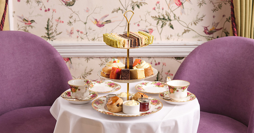 Afternoon tea served on vintage crockery.