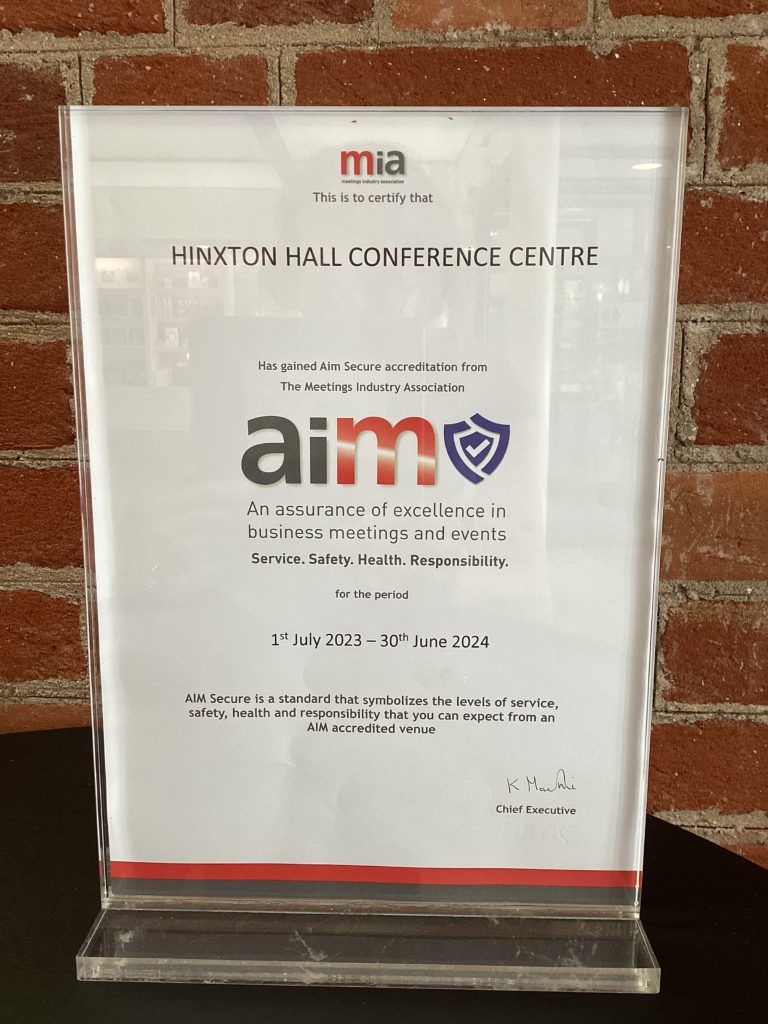 Photograph of Hinxton Hall Conference Centre's AIM Secure accrediation certificate