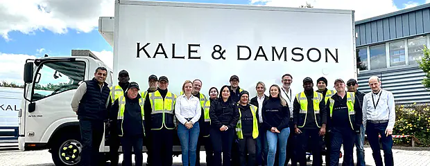 The Kale & Damson team standing in front of a K&D lorry.